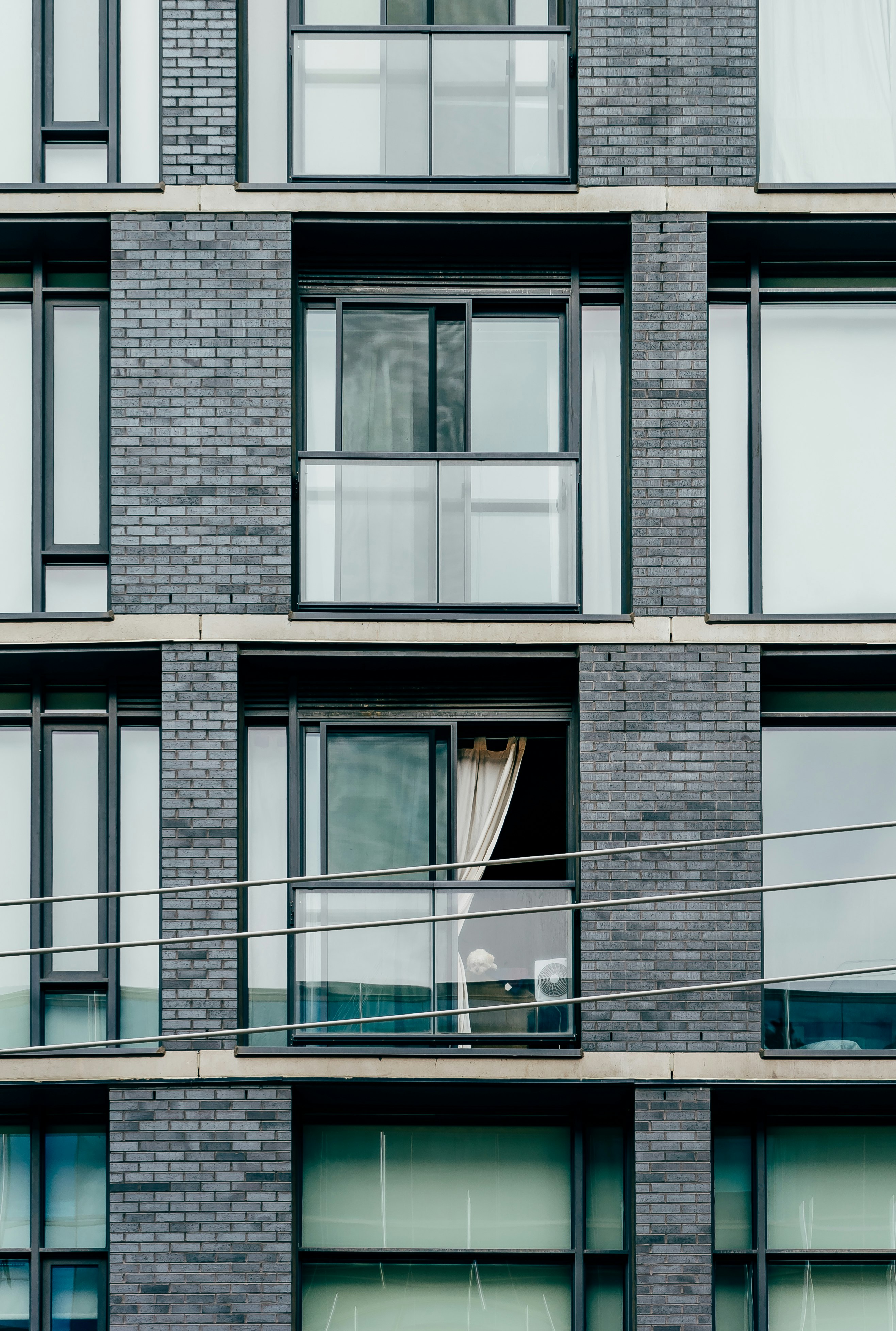 gray concrete building with glass windows